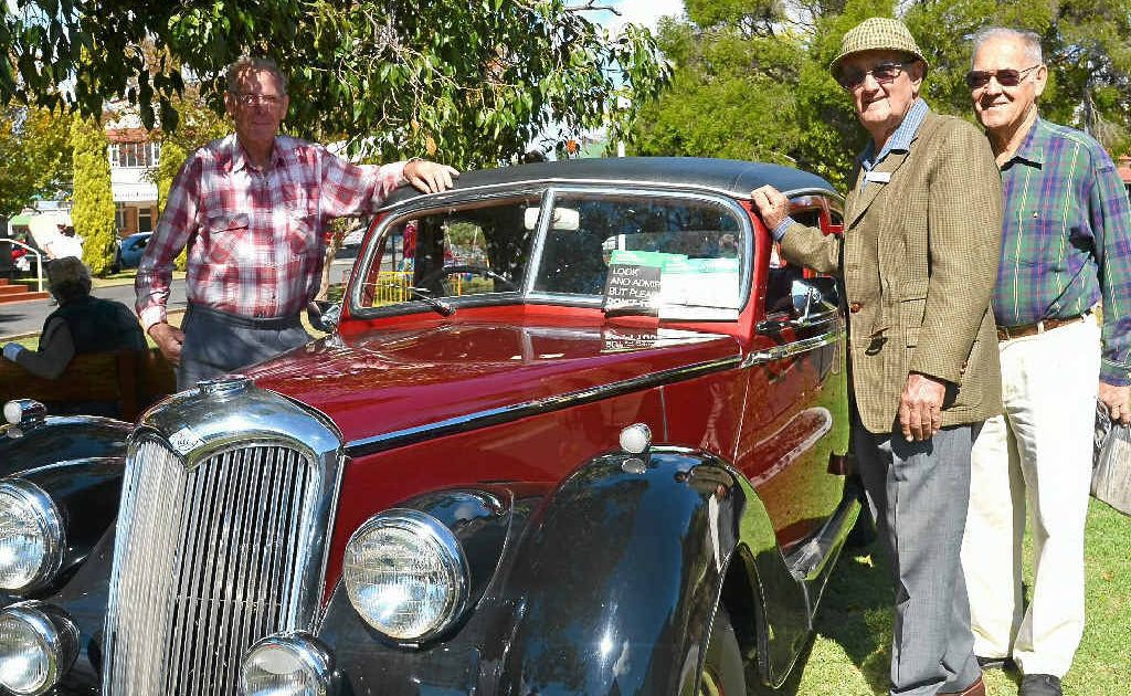 Percy Cutmore, Keith Ireland and Les Meiklejohn with Keith’s 1951 Riley sedan at the Anglican fete on Saturday. Percy Cutmore, Keith Ireland and Les Meiklejohn with Keith’s 1951 Riley sedan at the Anglican fete on Saturday.